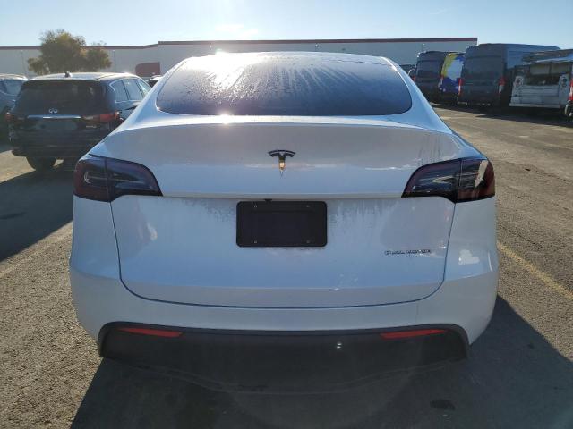 Photo 6 from auction – 2023 TESLA MODEL Y with VIN 7SAYGDEE8PF600399