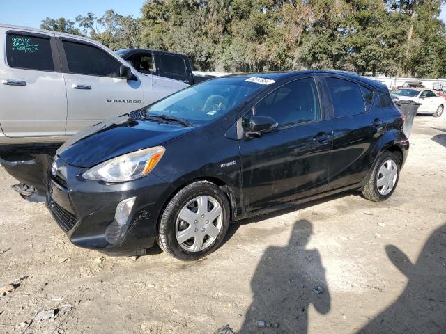 TOYOTA PRIUS C 2016 with VIN JTDKDTB37G1133588 - Photo from auction