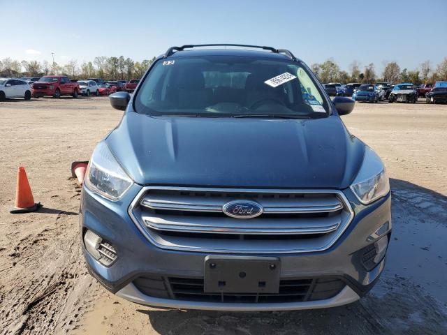 Photo 5 from auction – 2018 FORD ESCAPE SE with VIN 1FMCU9GD4JUC01551