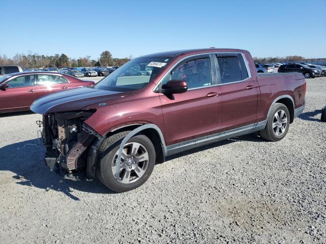 HONDA RIDGELINE 2018 с VIN 5FPYK2F66JB002480 - Фото с аукциона
