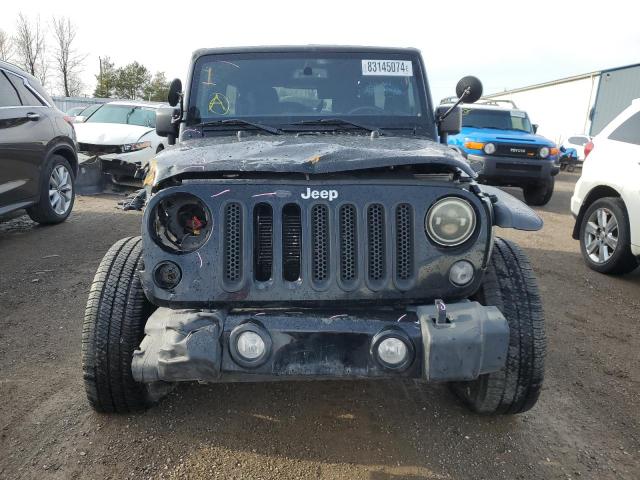 Photo 5 from auction – 2015 JEEP WRANGLER U with VIN 1C4BJWDG4FL565486