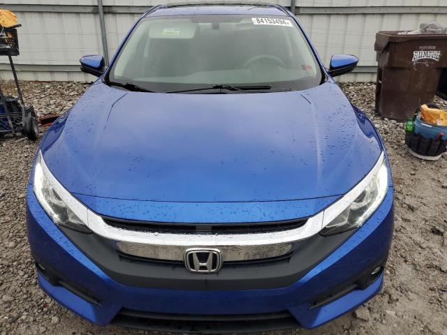 Photo 5 from auction – 2017 HONDA CIVIC EX with VIN 19XFC1F31HE024531