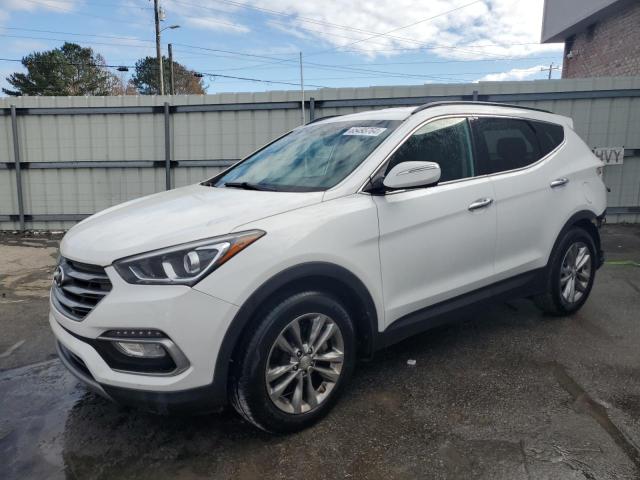 Photo 1 from auction – 2018 HYUNDAI SANTA FE S with VIN 5NMZU4LA9JH061307