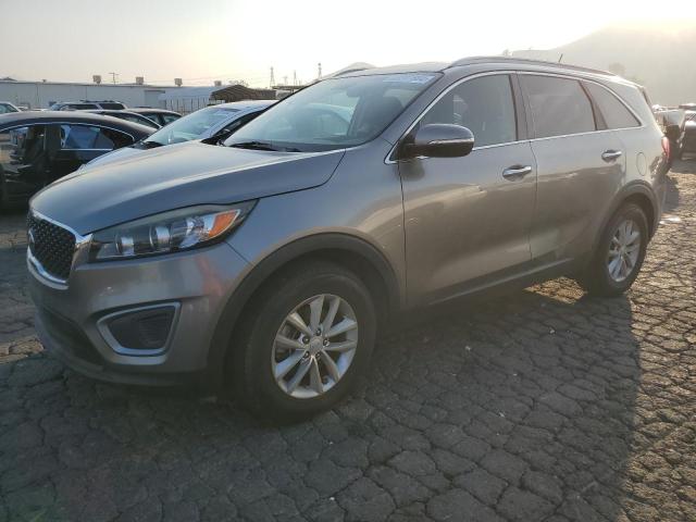 KIA SORENTO LX 2016 with VIN 5XYPG4A56GG079206 - Photo from auction