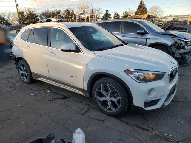 Photo 4 from auction – 2016 BMW X1 XDRIVE2 with VIN WBXHT3C30G5E49036