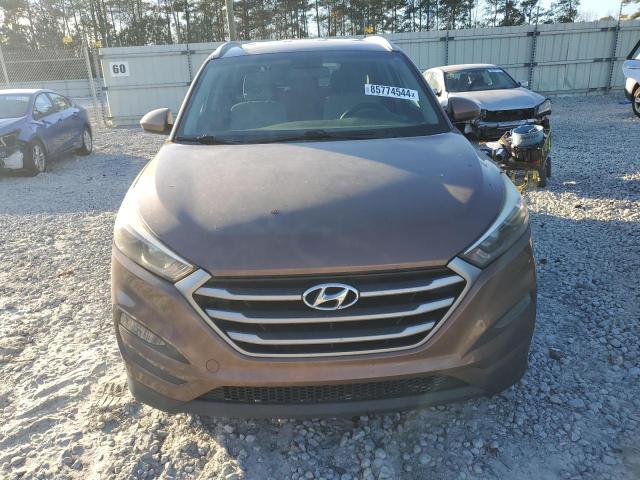 Photo 5 from auction – 2017 HYUNDAI TUCSON LIM with VIN KM8J33A42HU594699