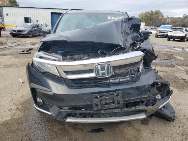 Photo 5 from auction – 2022 HONDA PILOT TOUR with VIN 5FNYF5H97NB017470