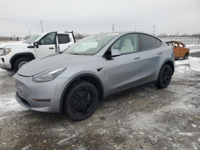 TESLA MODEL Y 2024 with VIN LRWYGDFD8RC662417 - Photo from auction