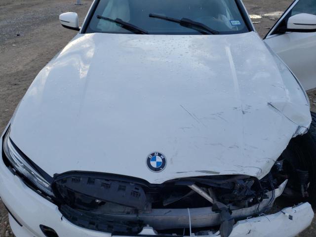 Photo 11 from auction – 2021 BMW 330I with VIN WBA5R1C03MFL53409