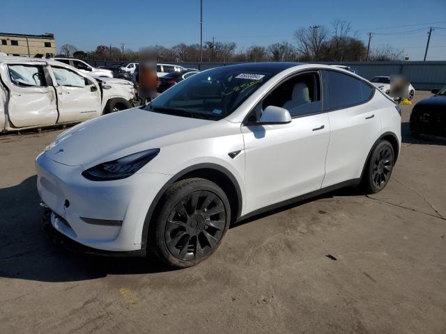 TESLA MODEL Y 2023 with VIN 7SAYGDEE2PA139861 - Photo from auction