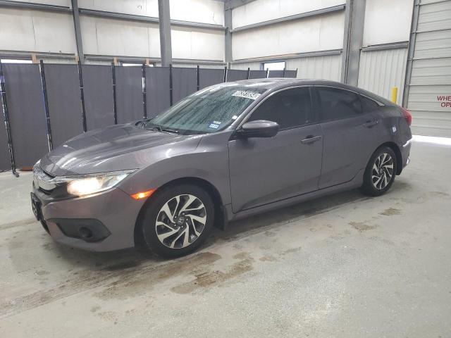 HONDA CIVIC EX 2018 with VIN 19XFC2F86JE013340 - Photo from auction