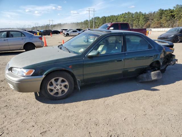 TOYOTA CAMRY LE 1999 with VIN JT2BF22K2X0219739 - Photo from auction