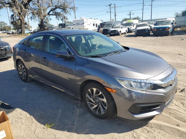 Photo 4 from auction – 2018 HONDA CIVIC EX with VIN 19XFC2F74JE203015