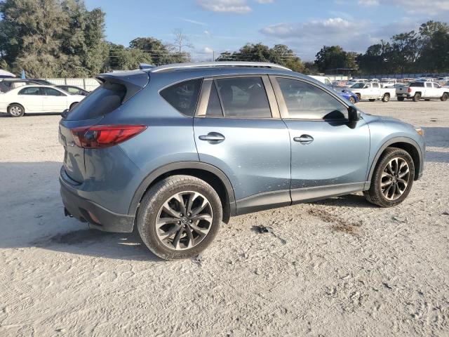 Photo 3 from auction – 2016 MAZDA CX-5 GT with VIN JM3KE2DY8G0602703