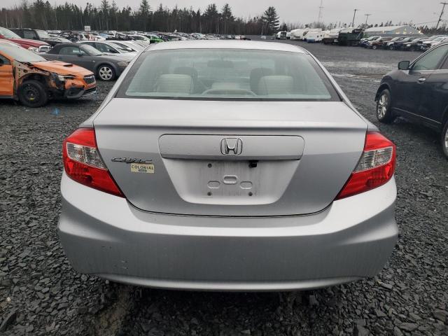 Photo 6 from auction – 2012 HONDA CIVIC LX with VIN 2HGFB2F42CH047011