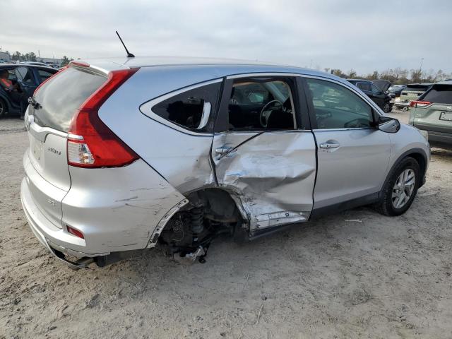 Photo 3 from auction – 2015 HONDA CR-V SE with VIN 2HKRM4H41FH101392