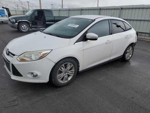 FORD FOCUS SEL 2012 with VIN 1FAHP3H27CL404220 - Photo from auction