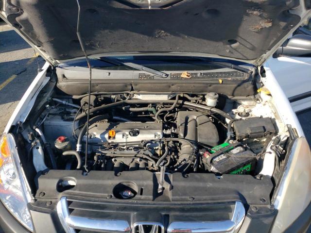 Photo 11 from auction – 2004 HONDA CR-V LX with VIN JHLRD68454C014179