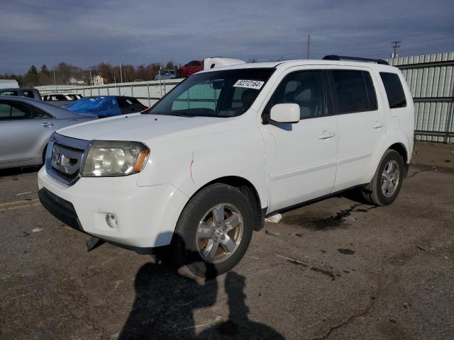HONDA PILOT EXL 2011 with VIN 5FNYF4H55BB067013 - Photo from auction