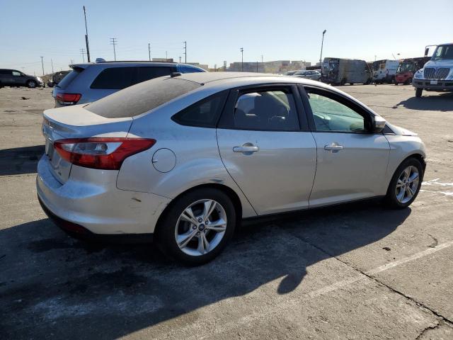 Снимка 3 от търг – 2014 FORD FOCUS SE с VIN 1FADP3F23EL101245