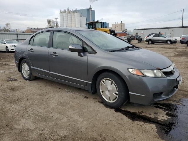 Photo 4 from auction – 2010 HONDA CIVIC HYBR with VIN JHMFA3F23AS001424