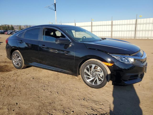 Photo 4 from auction – 2018 HONDA CIVIC EX with VIN 2HGFC2F70JH606303