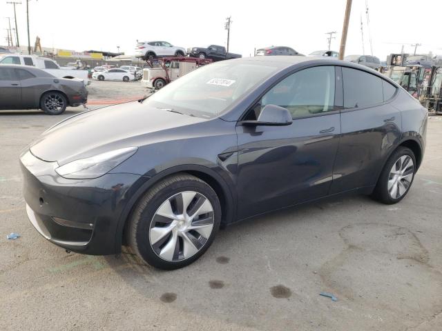 TESLA MODEL Y 2024 with VIN 7SAYGDEE0RA256700 - Photo from auction