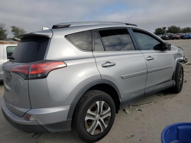 Photo 3 from auction – 2018 TOYOTA RAV4 LE with VIN 2T3ZFREV5JW418520