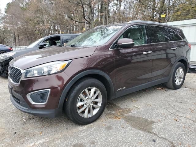 KIA SORENTO LX 2016 with VIN 5XYPGDA5XGG047665 - Photo from auction