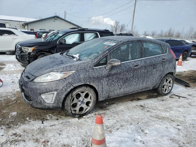 FORD FIESTA SES 2012 with VIN 3FADP4FJ1CM176115 - Photo from auction