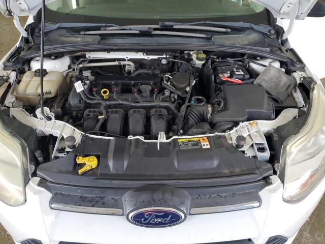 Photo 11 from auction – 2014 FORD FOCUS S with VIN 1FADP3E26EL220280