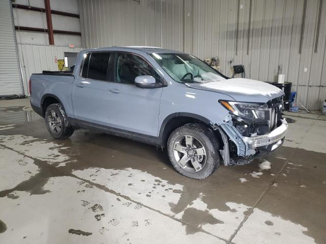 Photo 4 from auction – 2024 HONDA RIDGELINE with VIN 5FPYK3F59RB003406