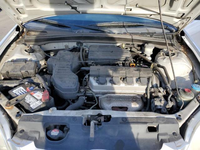 Photo 11 from auction – 2003 HONDA CIVIC DX with VIN 1HGEM22263L026935