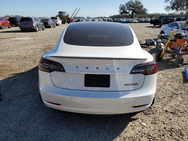 Photo 6 from auction – 2022 TESLA MODEL 3 with VIN 5YJ3E1EC2NF195969