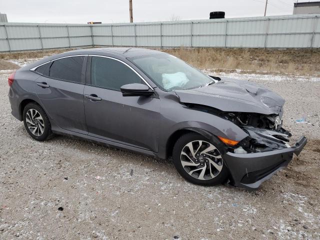 Photo 4 from auction – 2018 HONDA CIVIC EX with VIN 2HGFC2F70JH563601