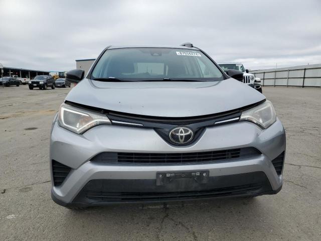 Photo 5 from auction – 2018 TOYOTA RAV4 LE with VIN 2T3BFREV5JW715529