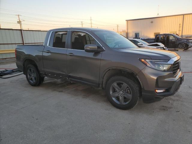 Photo 4 from auction – 2023 HONDA RIDGELINE with VIN 5FPYK3F56PB009726