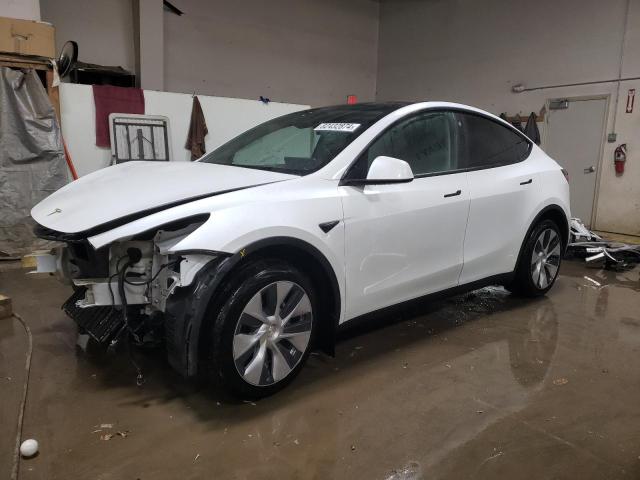 TESLA MODEL Y 2023 with VIN 7SAYGDEE2PF601838 - Photo from auction