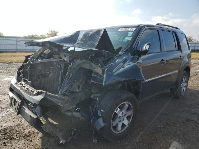 HONDA PILOT TOUR 2011 with VIN 5FNYF3H9XBB010769 - Photo from auction