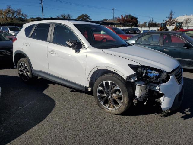 Photo 4 from auction – 2016 MAZDA CX-5 GT with VIN JM3KE2DY1G0752488