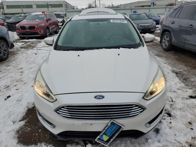 Photo 5 from auction – 2015 FORD FOCUS TITA with VIN 1FADP3J20FL280160