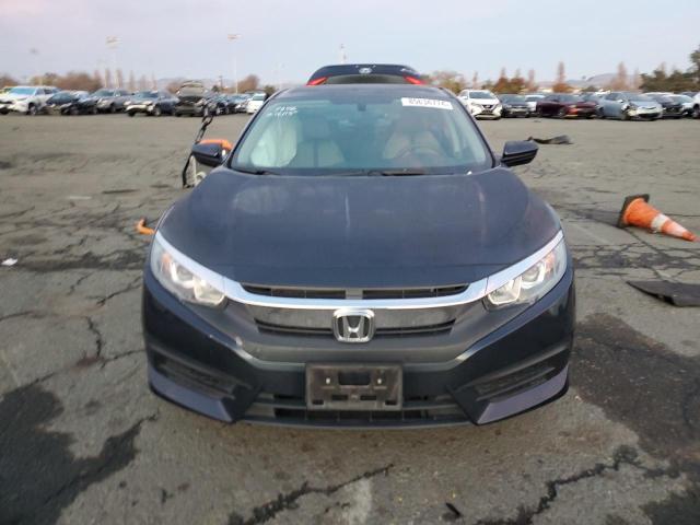 Photo 5 from auction – 2018 HONDA CIVIC LX with VIN 2HGFC2F58JH610159