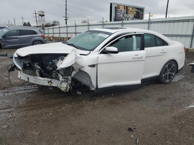 FORD TAURUS SEL 2016 with VIN 1FAHP2H8XGG143985 - Photo from auction