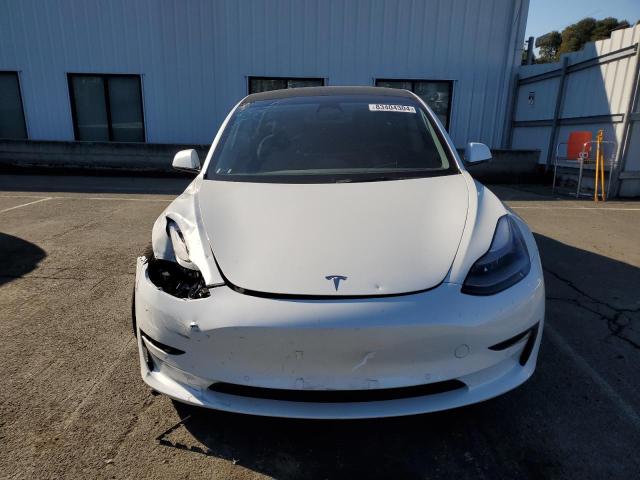 Снимка 5 от търг – 2022 TESLA MODEL 3 с VIN 5YJ3E1EB8NF166211