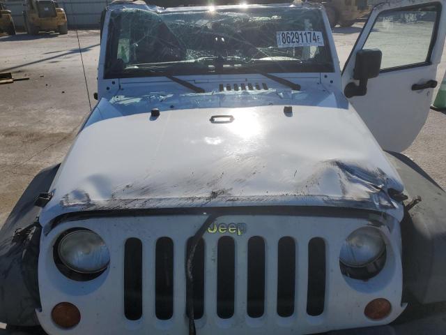 Photo 11 from auction – 2013 JEEP WRANGLER U with VIN 1C4BJWDG2DL680102