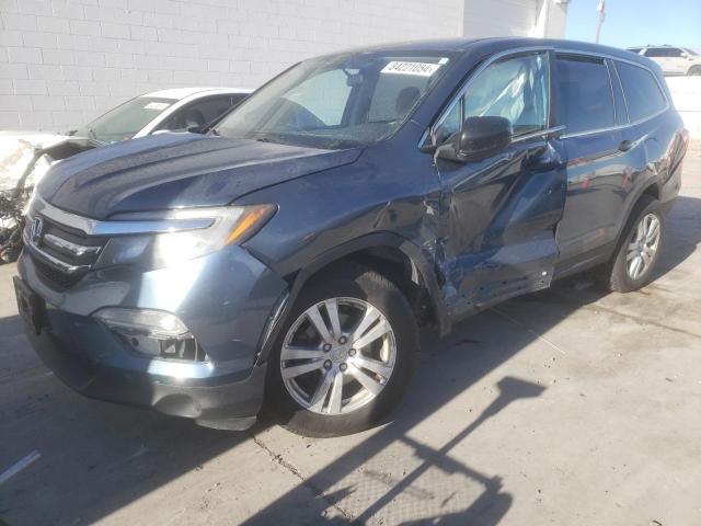 HONDA PILOT LX 2016 with VIN 5FNYF6H19GB123891 - Photo from auction