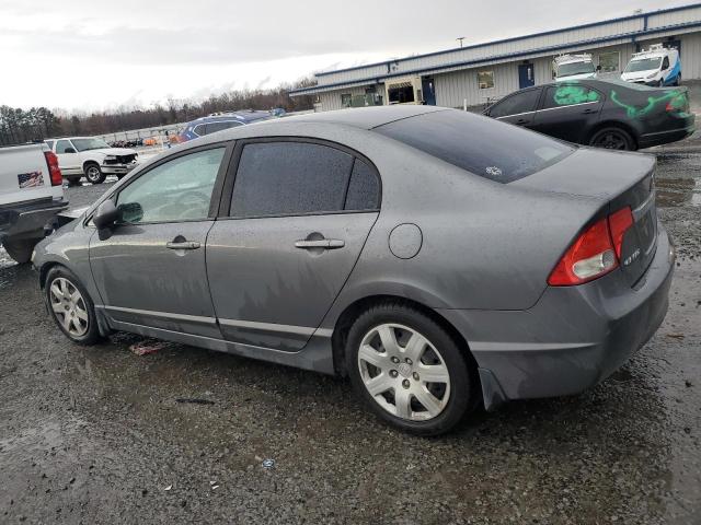 Photo 2 from auction – 2010 HONDA CIVIC LX with VIN 19XFA1F52AE037950