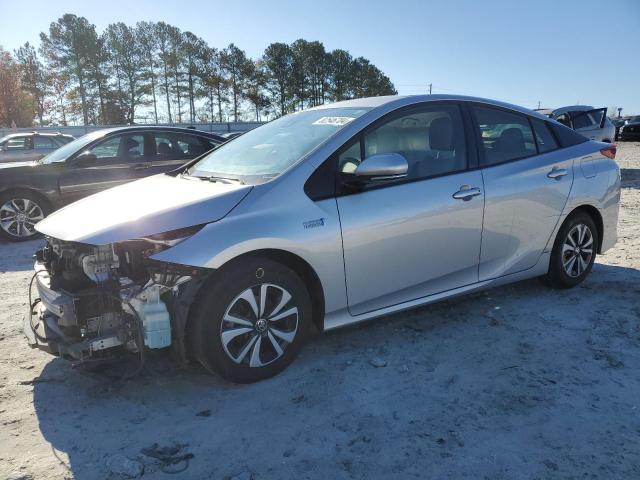 TOYOTA PRIUS PRIM 2018 with VIN JTDKARFP7J3076670 - Photo from auction