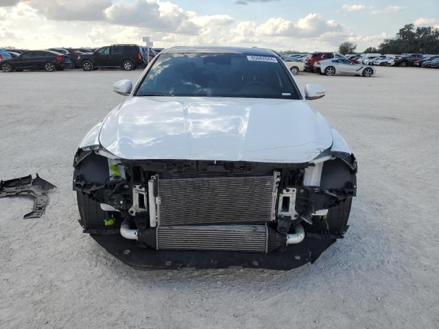 Photo 5 from auction – 2023 GENESIS G70 BASE with VIN KMTG34TA4PU104576