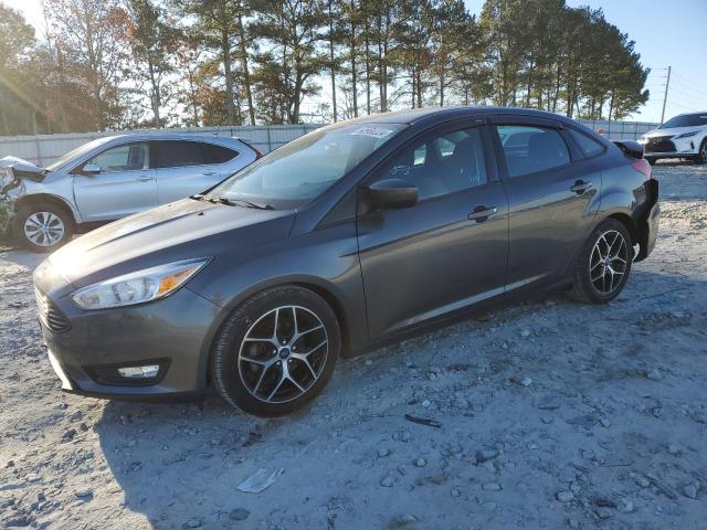 FORD FOCUS SE 2018 with VIN 1FADP3F22JL308090 - Photo from auction